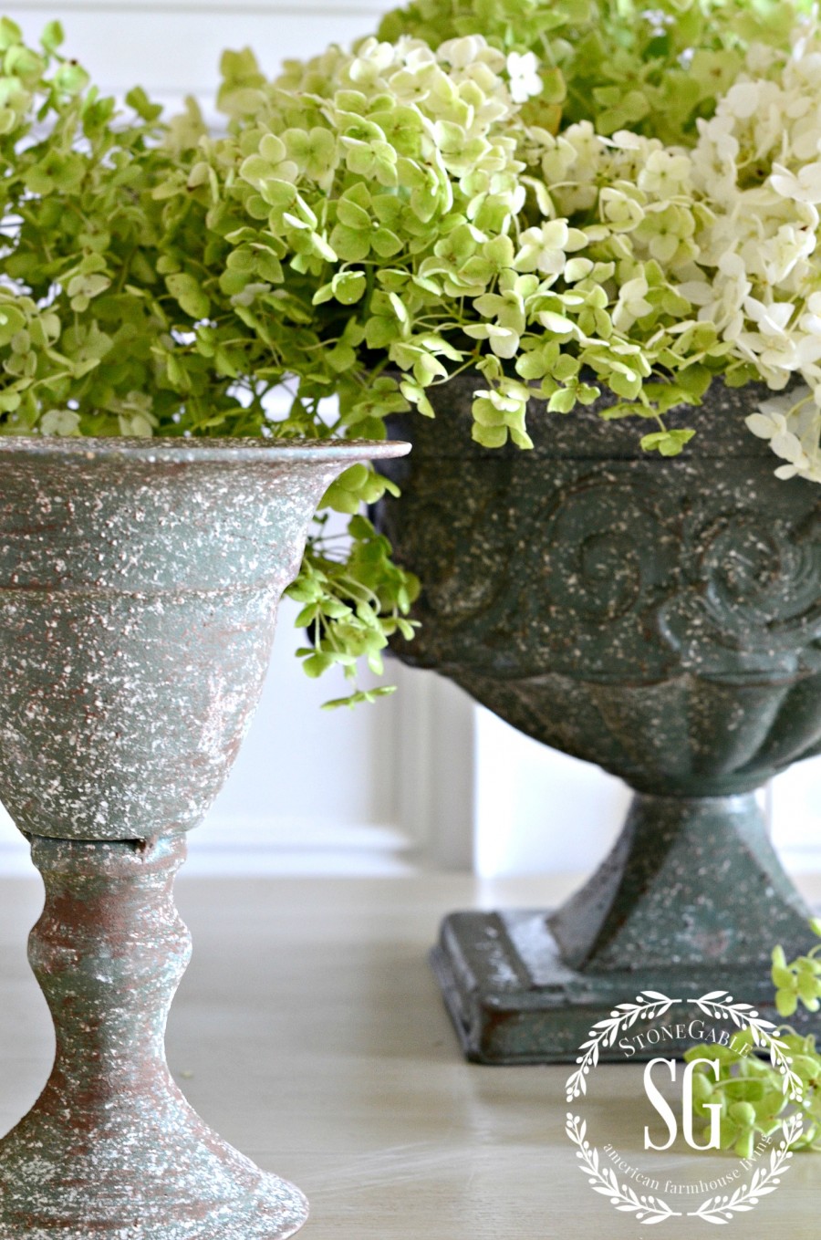 GROUPING LIKE DECOR- trophy urns-with hydrangeas-different sizes-stonegableblog.com
