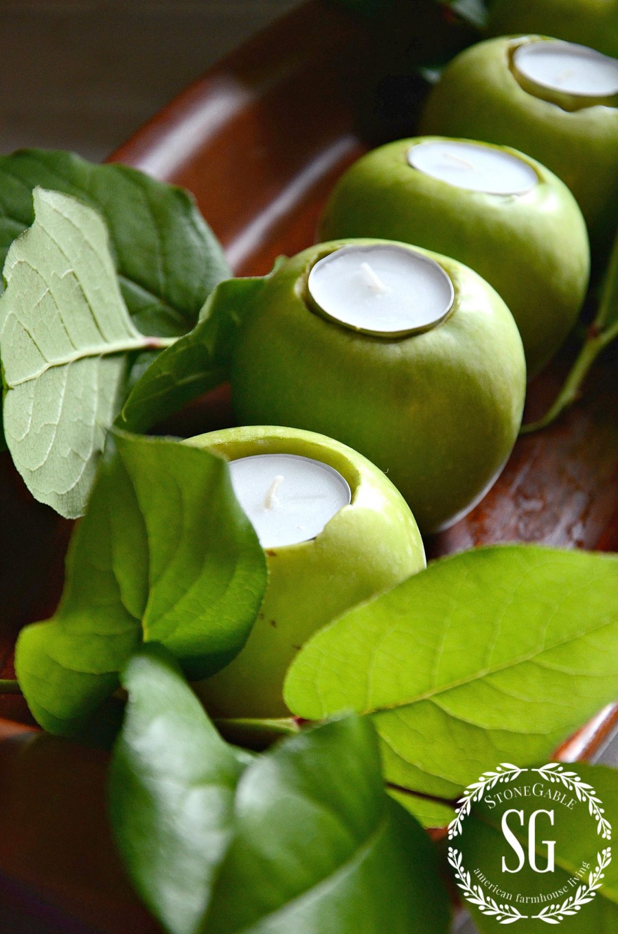 GREEN APPLE CENTERPIECE- green apples with votive in wooden bowls-stonegableblog.com