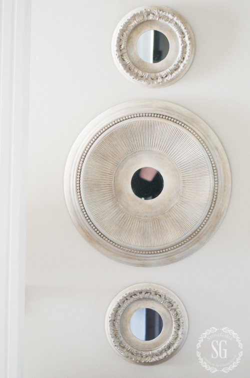 BEAUTIFUL PAINTED MEDALLION MIRROR DIY- Change a plastic ceiling medallion into a work of art mirror. Easy diy with loads of instructions and images.