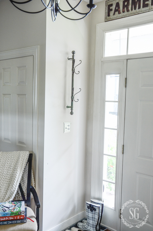 HOOKS IN THE FOYER-Creating a welcoming place for guest to put their things as they enter your home.