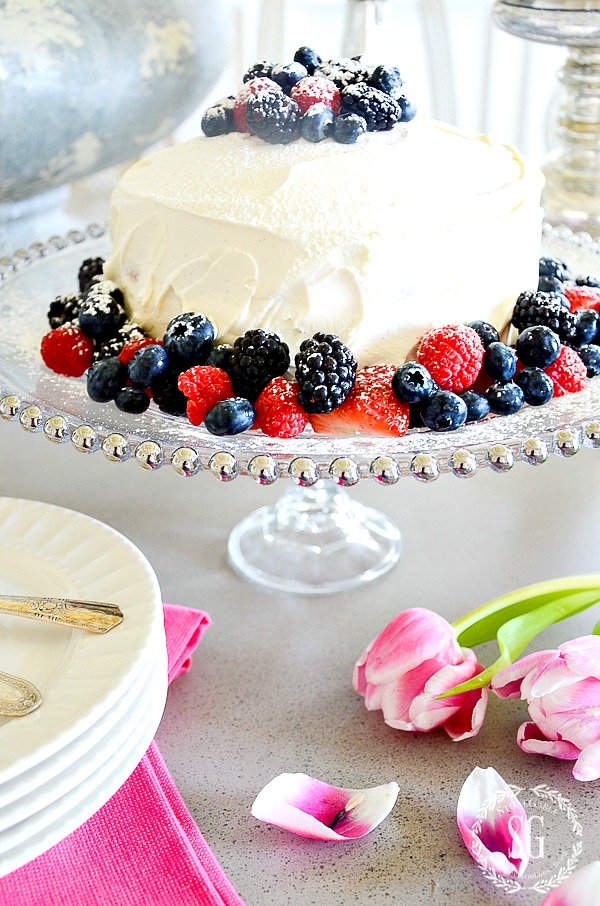 EASY CAKE PLATE PEDESTAL DIY- With just two inexpensive household items and glue you can have a one-of-a-kind cake pedestal!