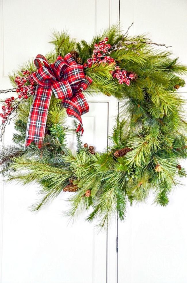 wreath with bow and red berries