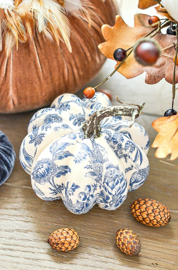 blue and white pumpkin with velvet pumpkins