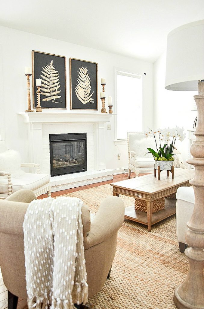 great room with large white fireplace