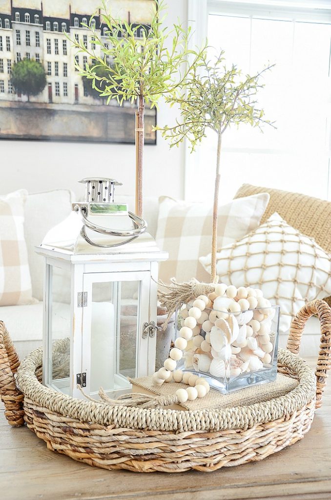 summer vignette on a coffee table