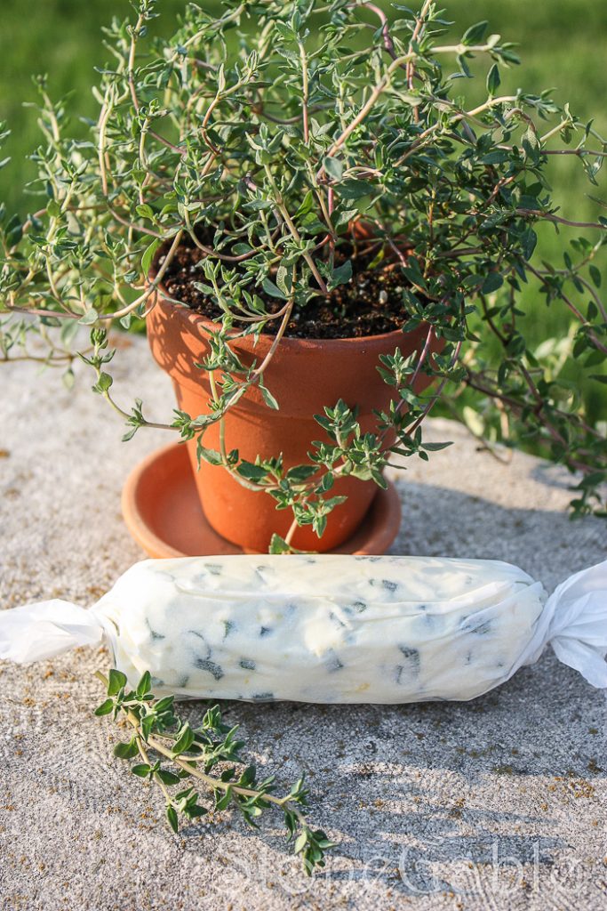 HERB BUTTER WRAPPED IN A PARCHMENT PAPER ROLL