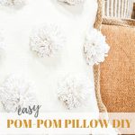 trio of pillows- pom-pom pillow is featured