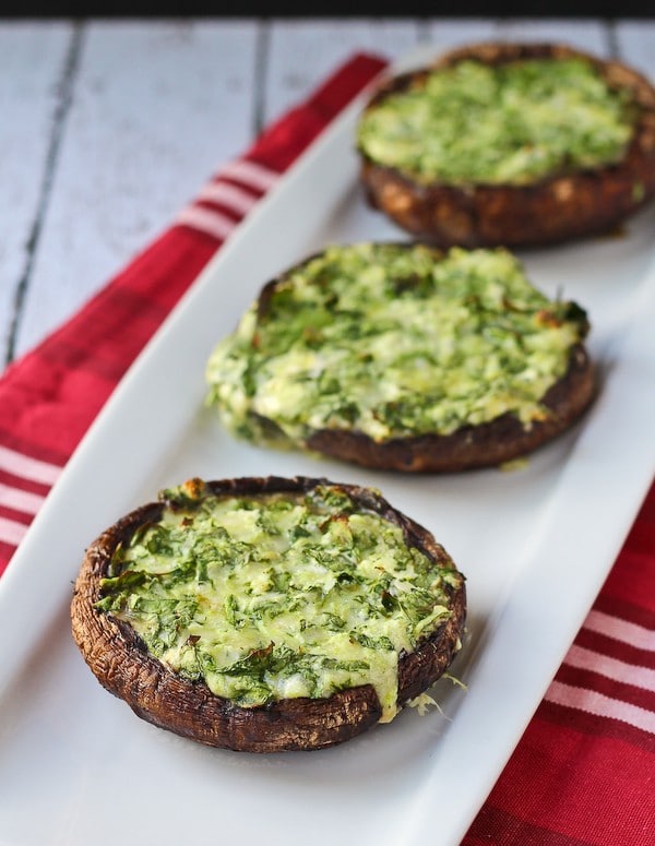 grilled portobello mushrooms on a white plate on the menu this week