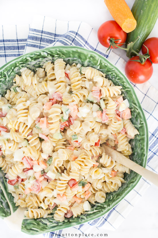 summer pasta salad in a green bowl on the menu this week