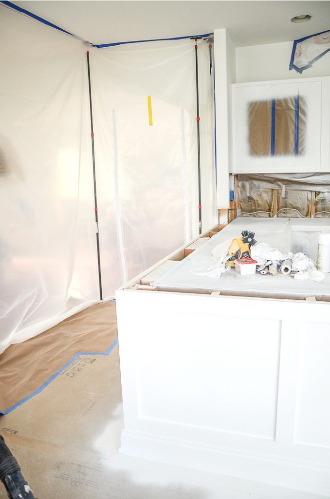 painting cabinets white in a kitchen renovation