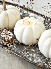 COLLAGE PIN OF A WHITE PUMPKIN WITH A CANDLE IN IT