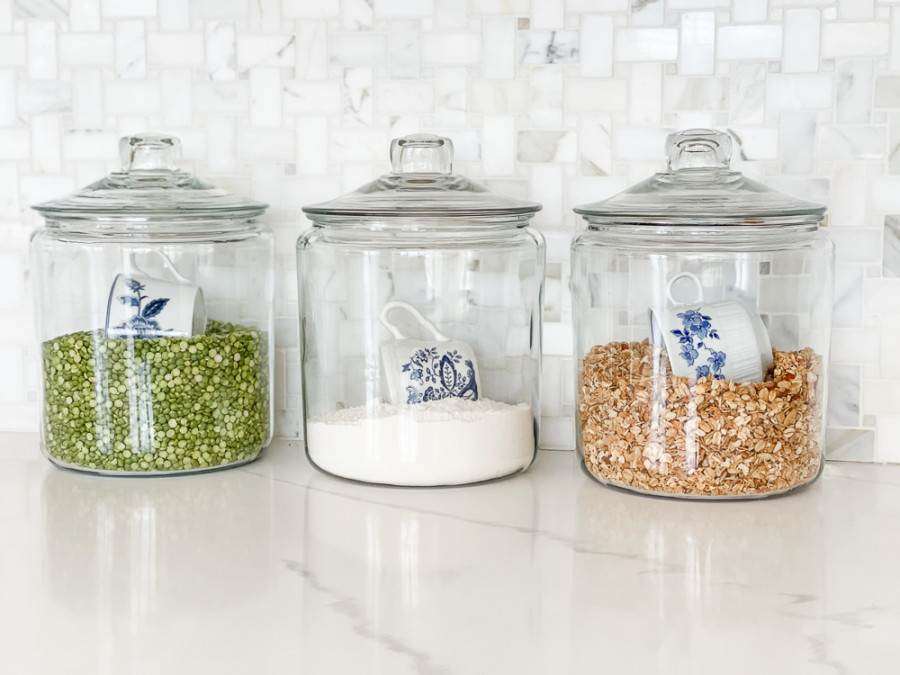 glass canisters on a kitchen counter