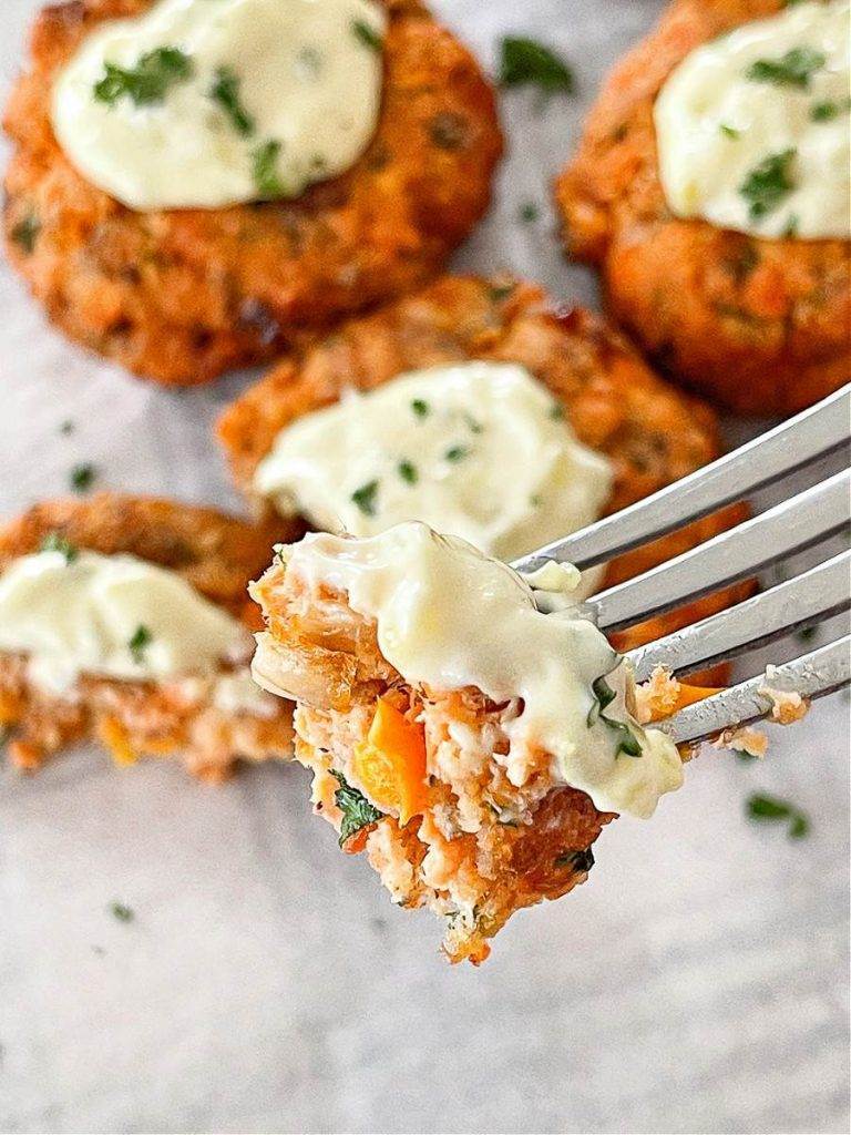 BITE OF SALMON CAKE ON A FORK