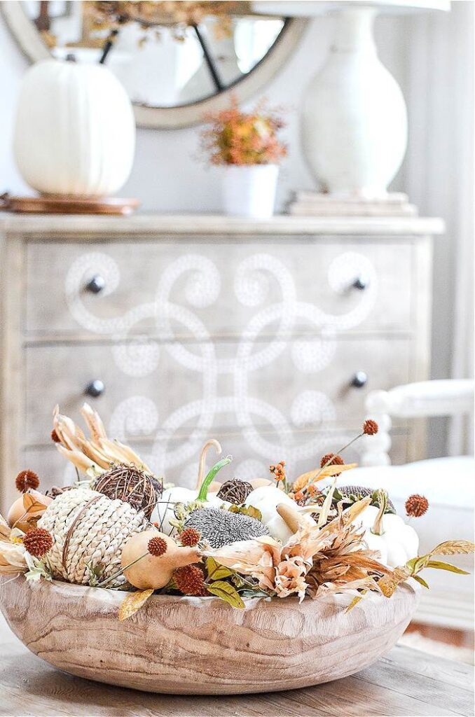 fall organic dough bowl using dried sunflowers, mini baby boo pumpkins and other beautiful fall organics.