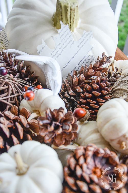 white natural fall dough bowl with pinecones and other organics