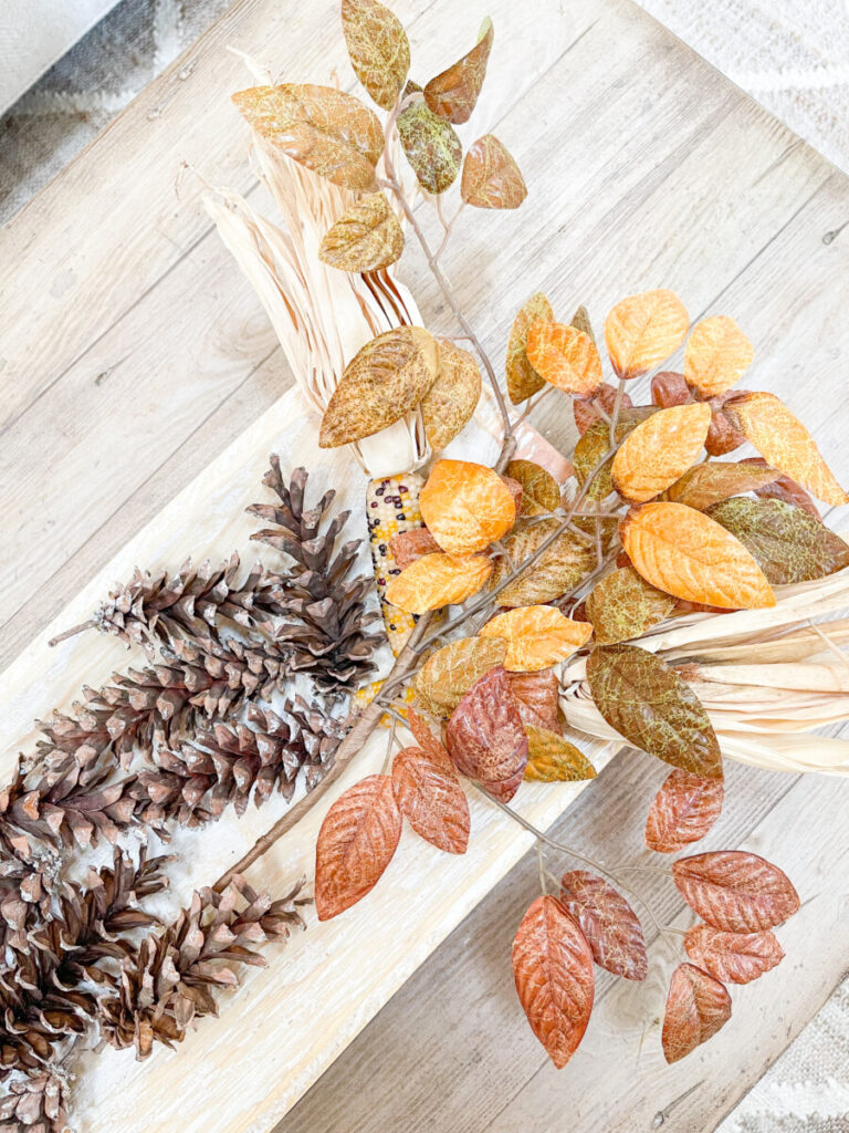 decorating the end of a fall arrangement