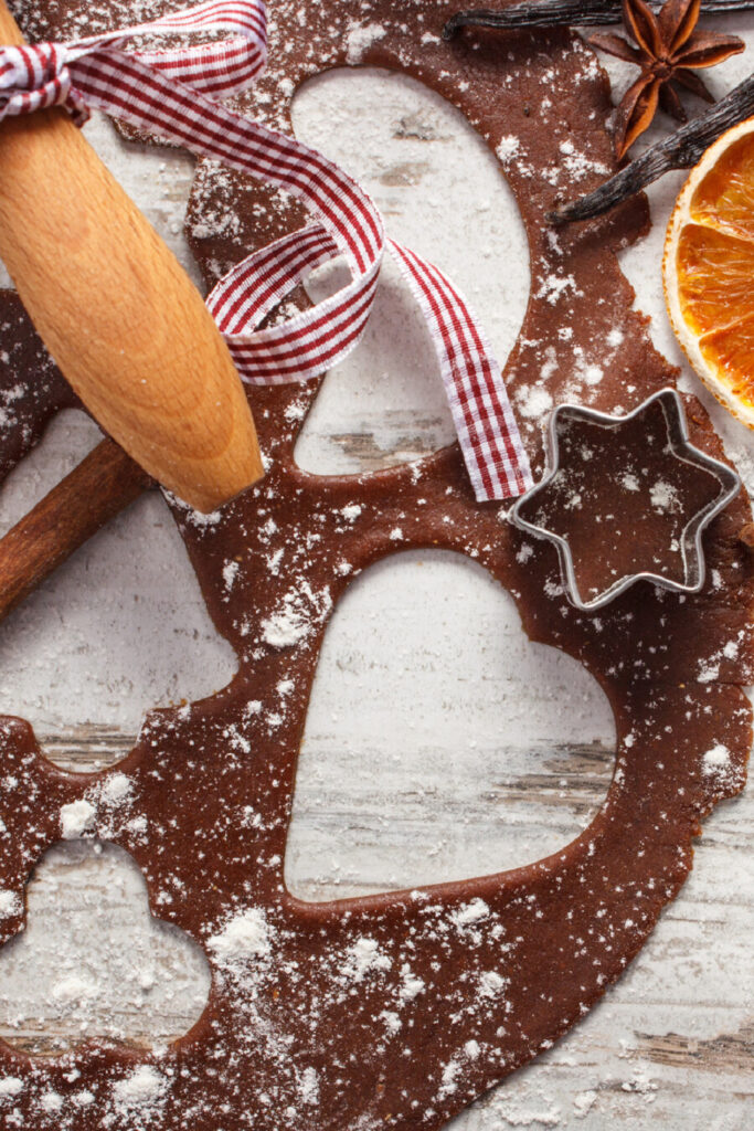 gingerbread cookies being cut out- on the menu Christmas week