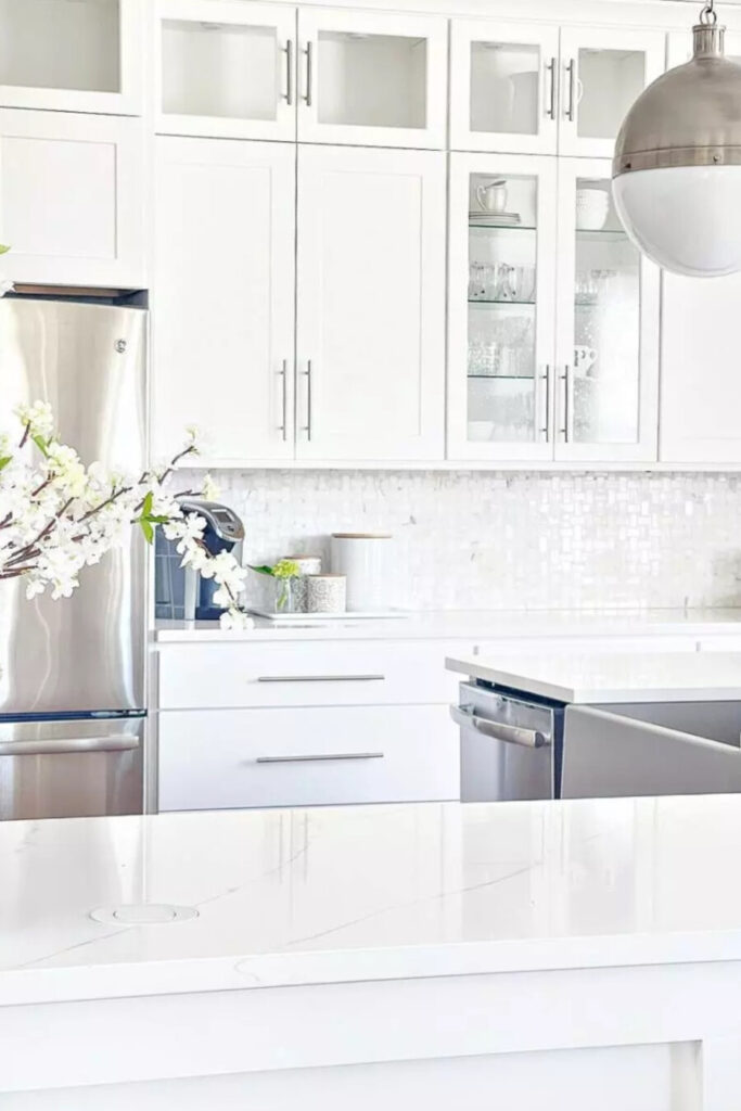 clean kitchen counters in a white kitchen