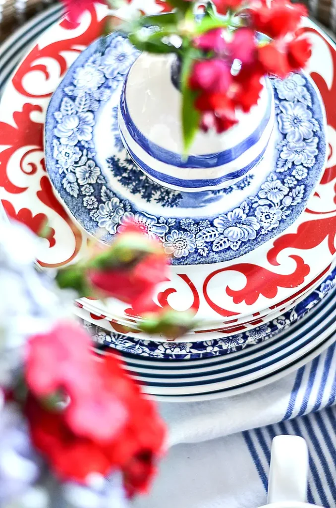 simple summer decorating ideas- red white and blue dishes stacked