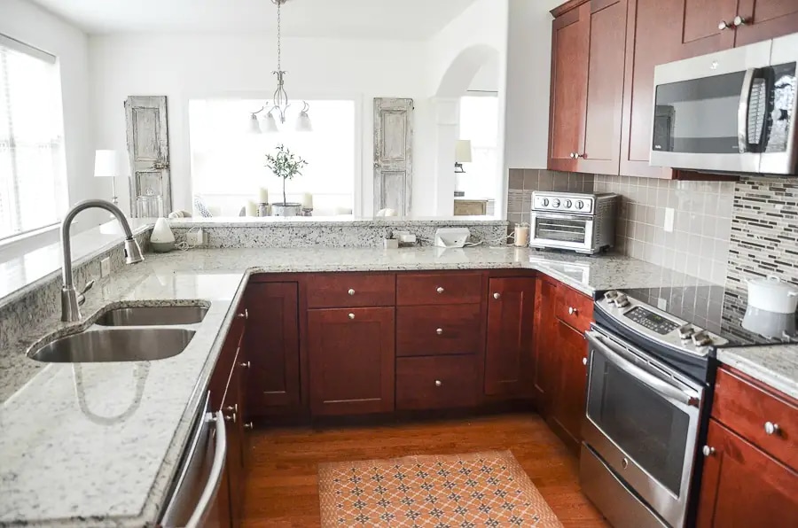 White Granite Countertops With Cherry Cabinets