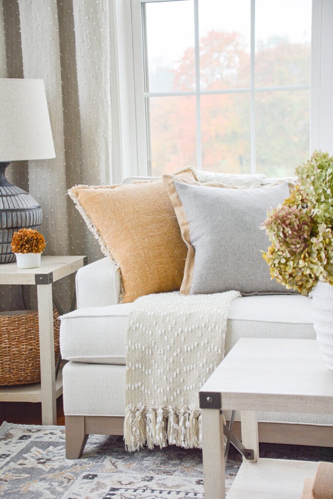 SMALL SPACES- PILLOWS AND A THROW ON A SOFA