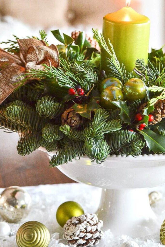 KEEPING LIVE CHRISTMAS GREENS FRESH- BEAUTIFUL WREATH USED AS A CENTERPIECE WITH A GREEN CANDLE