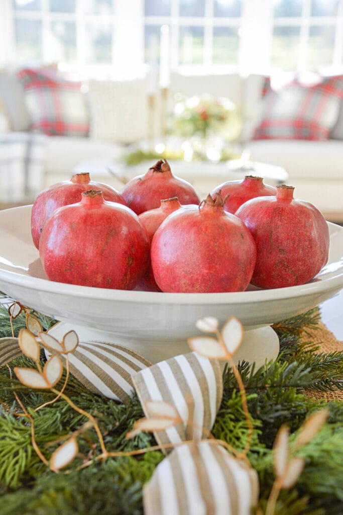 BEST THINGS TO DO IN DECEMBER- POMEGRANATES IN A WHITE BOWL
