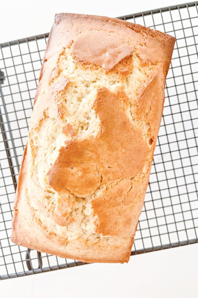 Almond Bread is a simple-to-make sweet quick bread laced with a light almond flavor and topped with a luscious vanilla glaze. Whip it up in minutes with what you have in your refrigerator and serve it for breakfast, dessert or a snack with coffee or tea.