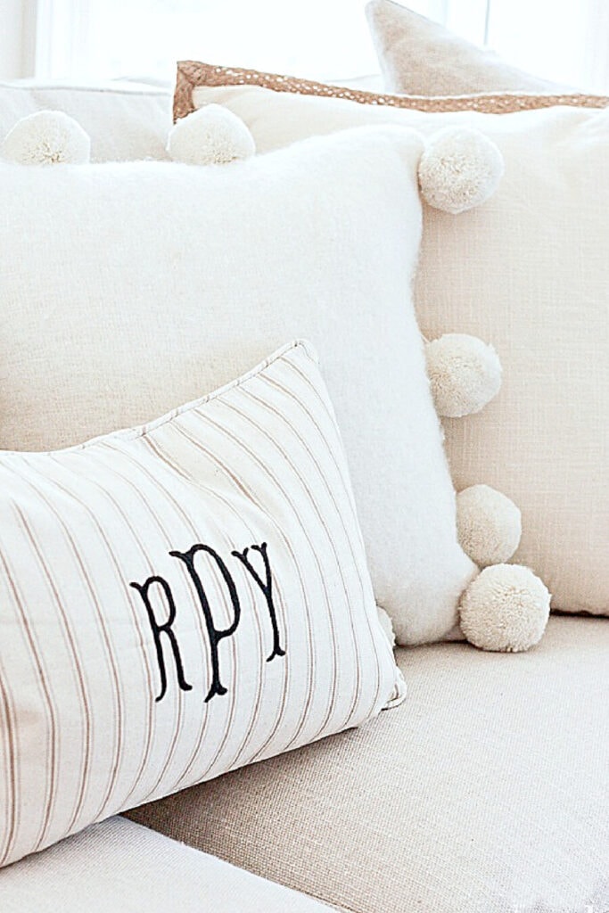 white pillows on a sofa