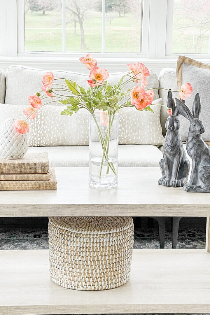 SPRING DECOR IDEAS- A HANDSOME PAIR OF BLACK RABBITS AS SEASON ACCENTS ON A COFFEE TABLE