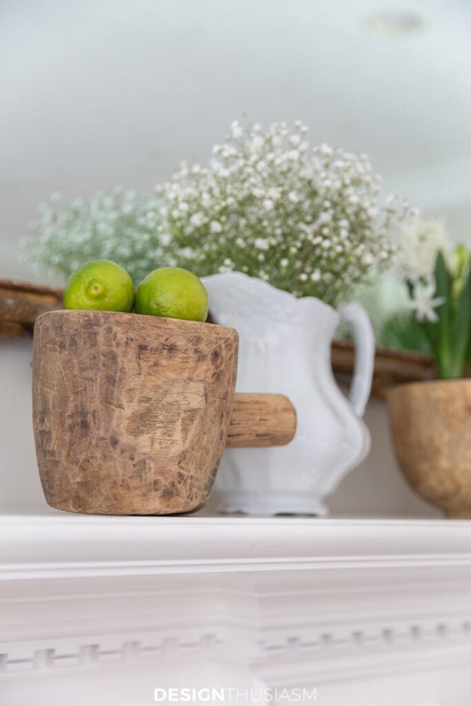 Wednesday Weekly Wishlist- a rustic handcarved bowl with lines and flowers in a pitcher in the background