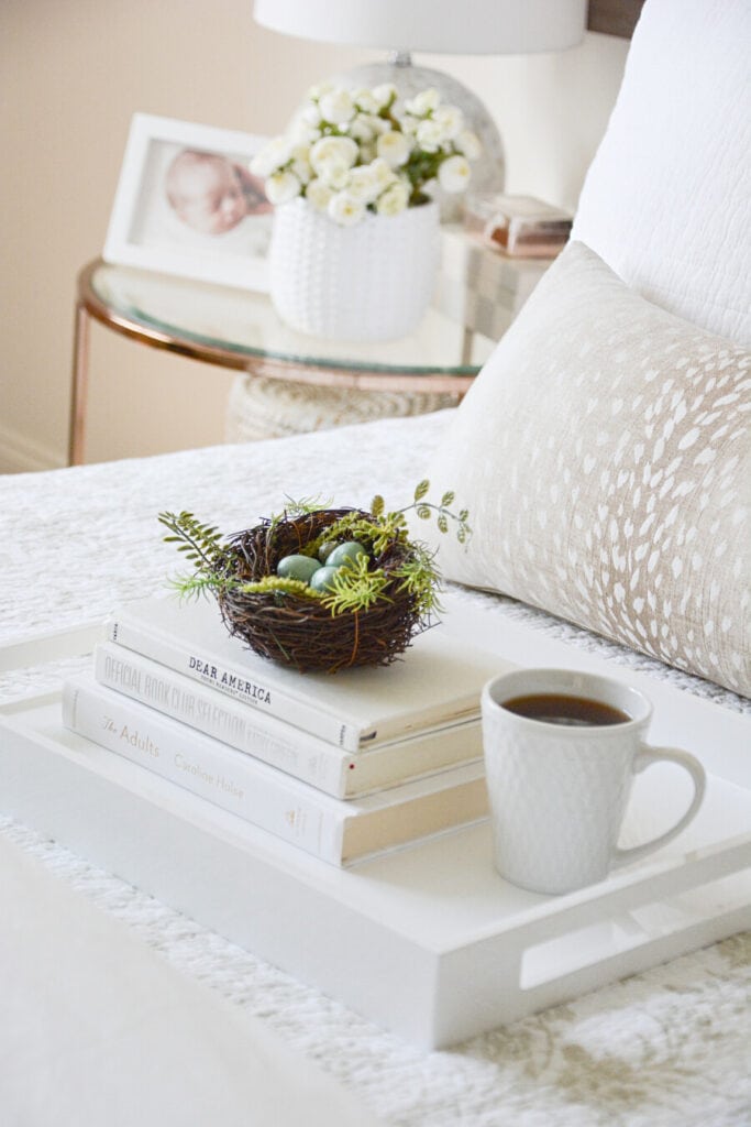 spring home tour- bed tray with a nest and a cup of coffee