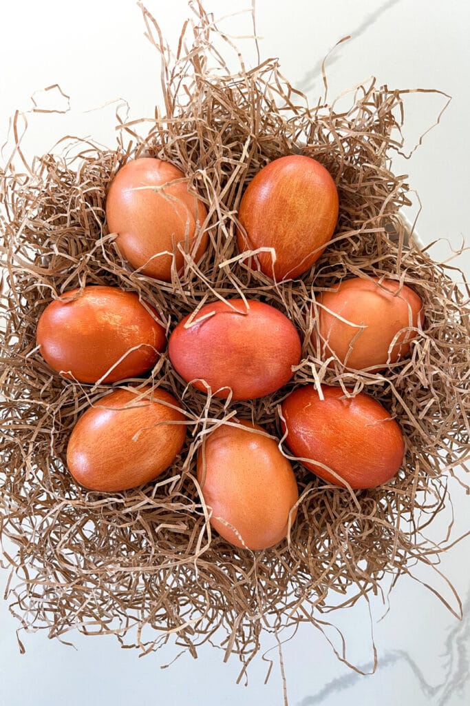 onion skin dyed Easter eggs- EGGS IN BROWN STRAW