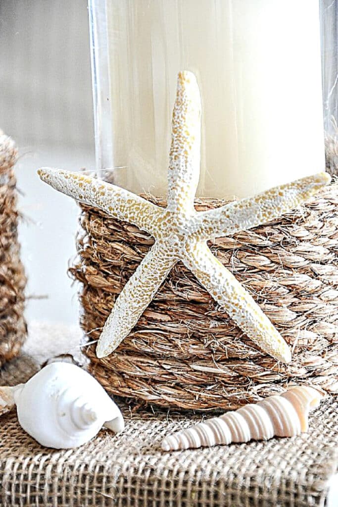 ROPE WRAPPED DIY CANDLE HOLDER WITH A STARFISH ON THE FRONT OF IT
