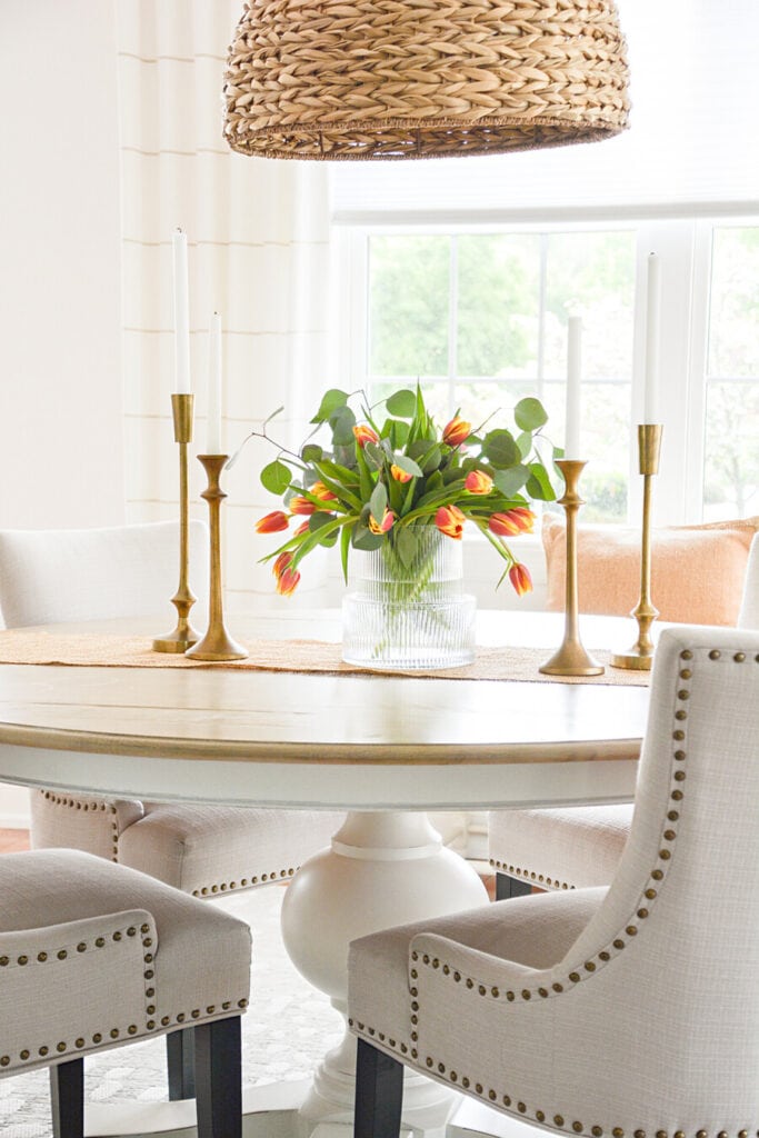 small dining room with a centerpiece of tulips