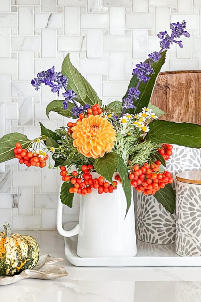 cut fall flowers on a kitchen counter