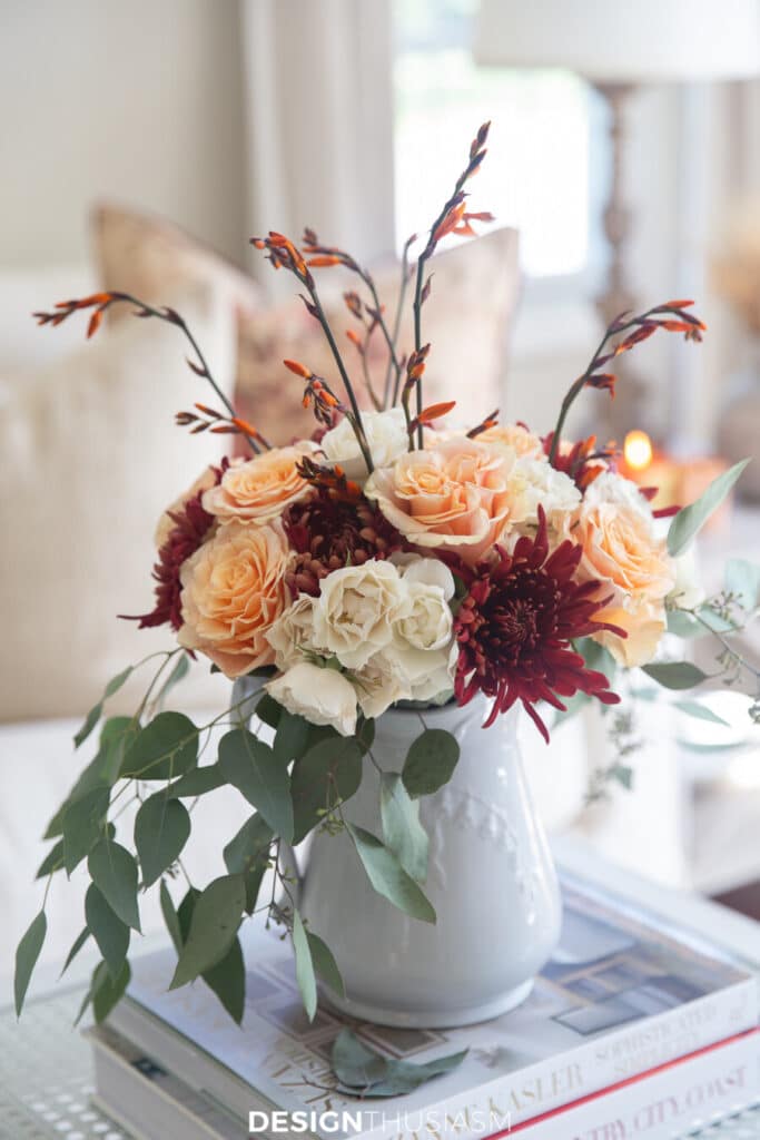 fall flowers in a pither