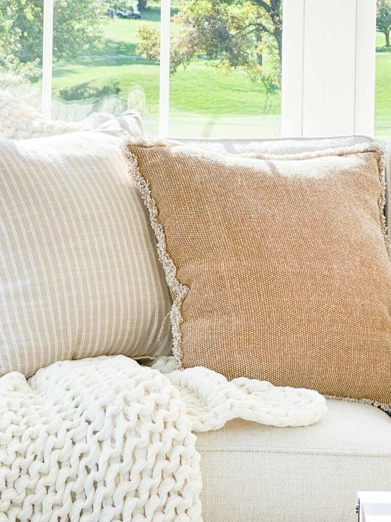 fall pillows and a cozy throw