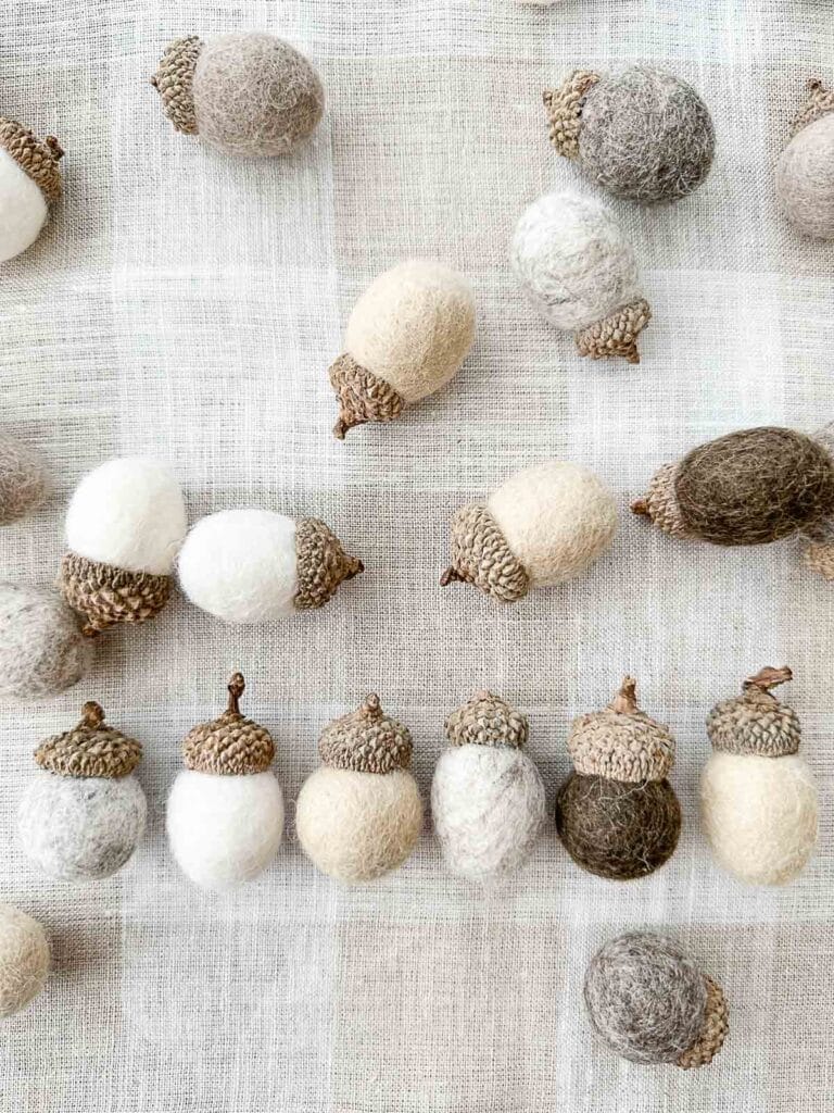 WOOL BALL ACORNS LINED UP