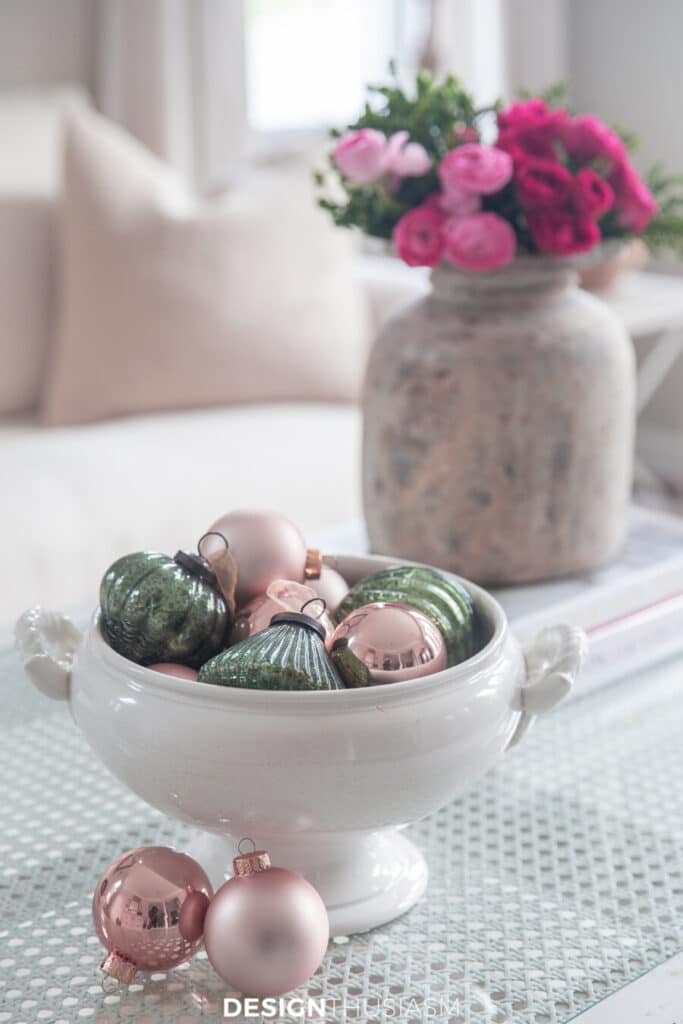 bowl of vintage green and pink ornaments