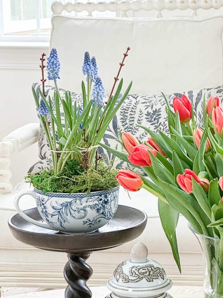 SPRING FLOWERS ON A COFFEE TABLE