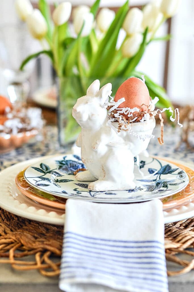 Easter place setting with rabbit egg holder.