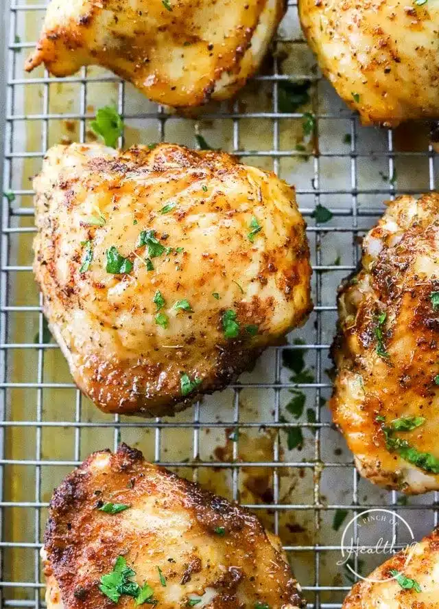 chicken thighs on a wire rack