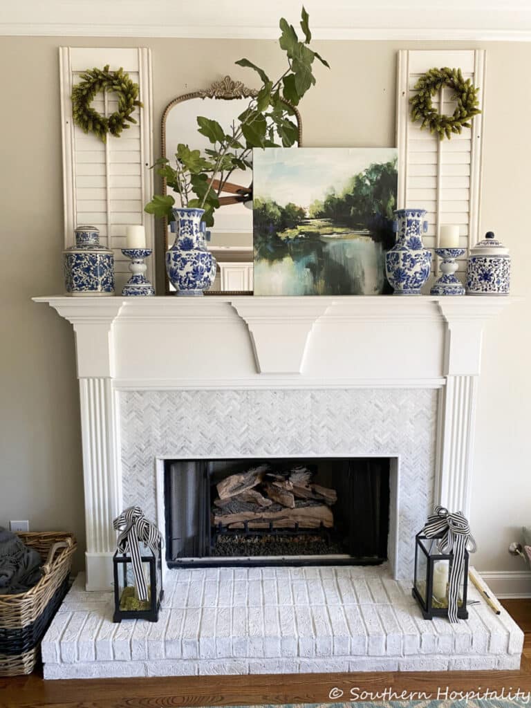 mantel with blue and white decor