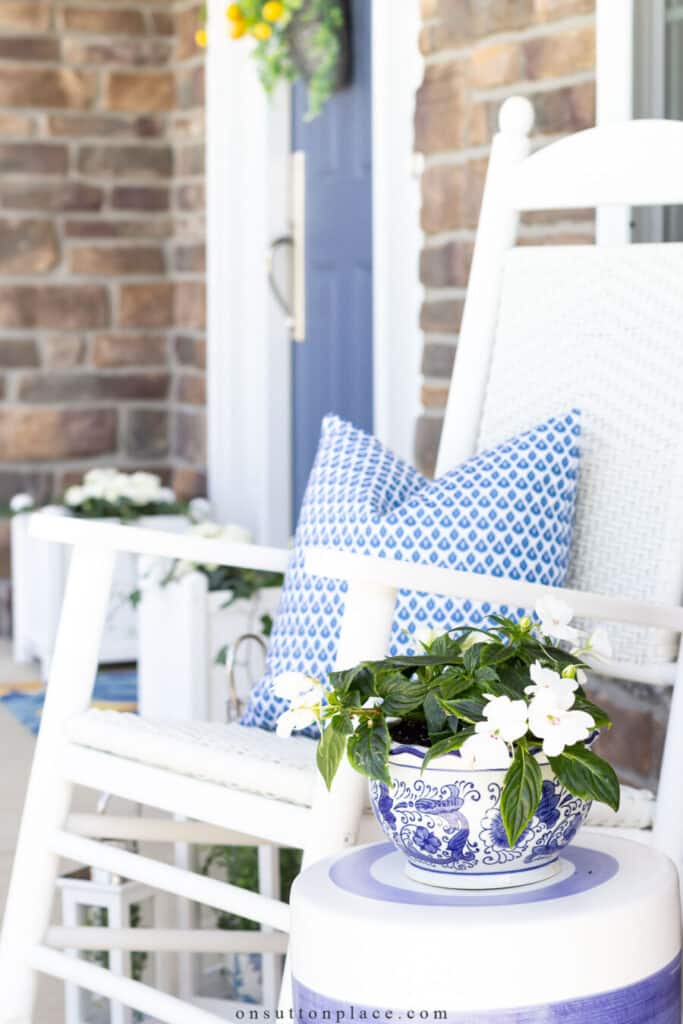 rockers on a front porch with blue and white accents