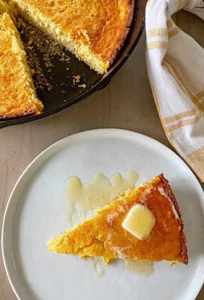 corn bread in a skillet and on a plate