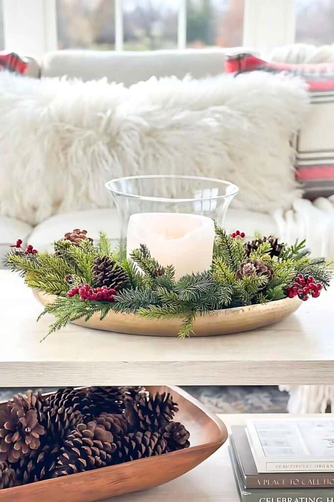 Shelf styled with natural and metallic holiday décor.